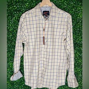 Never worn. Plaid button up shirt. Medium in size.